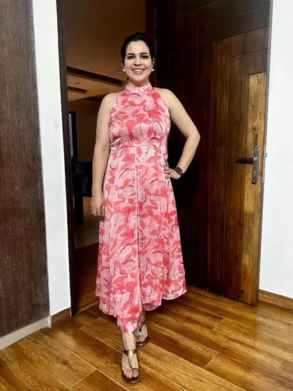 A throwback to this outfit I created from scratch. This halter-neck pink printed kurta was made from an old saree. It's a great example of how you can upcycle your mother's old sarees into trendy new outfits.