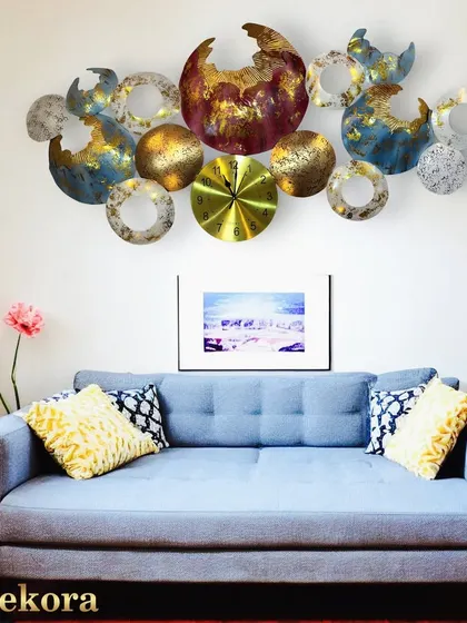 The unique design of this abstract clock makes it a focal point in any contemporary living room.