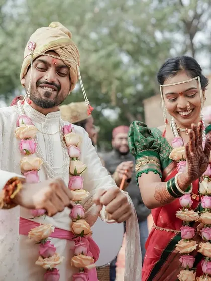 Pure happiness and excitement as the Maharashtrian wedding rituals unfold. We focus on capturing the couple's genuine reactions and the festive energy of their special day.
