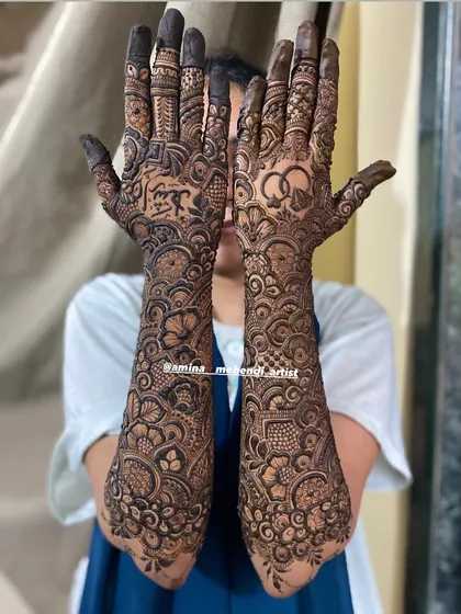 A full view of the design with the ring motif and the name 'Rizwan'.