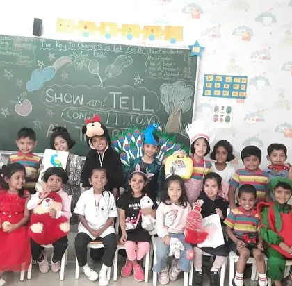 Another group of our little shining stars after participating in the 'Show and Tell' competition, where they spoke with enthusiasm about their chosen topics.