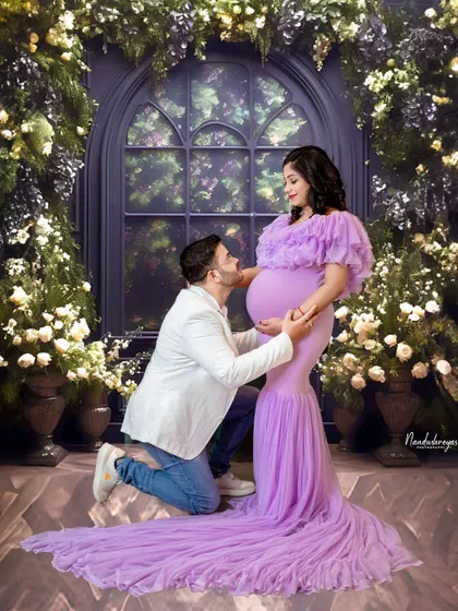 A duplicate of 45, this image captures the pure love and excitement of the father-to-be in a beautifully crafted studio environment.