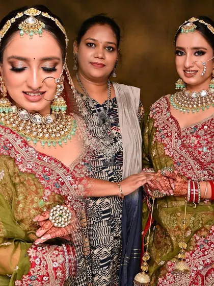 Another one of my talented students with her model. The green and red lehenga is beautifully complemented by the soft glam makeup.