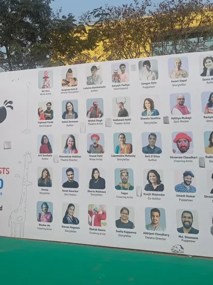A photo of the artist wall at the Kukdukoo Fest, featuring me among many other talented storytellers and performers. It is an honor to be part of such a vibrant creative community.