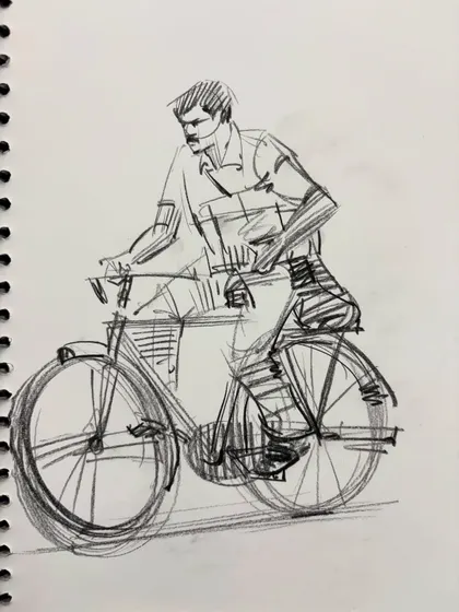 A sketch of a man on a bicycle, a great practice for drawing figures interacting with objects.