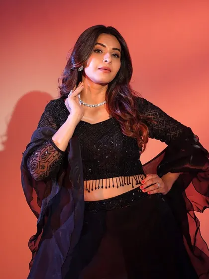 Another shot of the classic black lehenga. The simple, elegant design makes it a versatile piece that you can dress up or down.