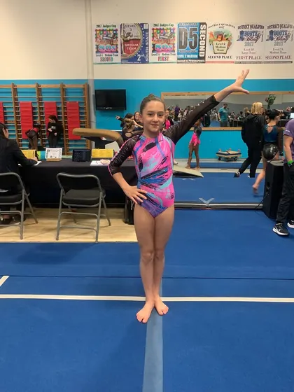 A confident pose from one of our Gold athletes at the state meet. She's ready for the next challenge: regionals!