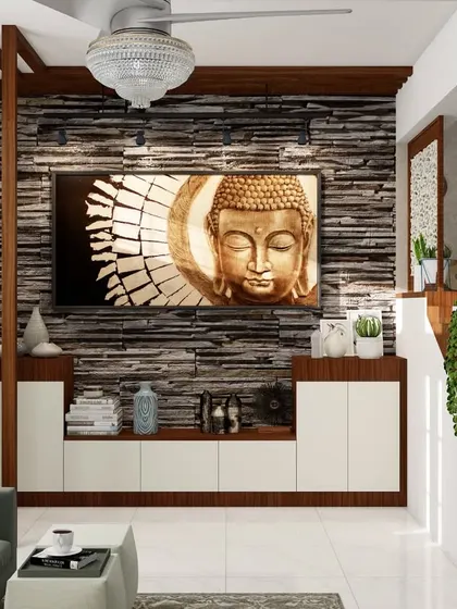 This design integrates the TV unit with the entryway, using a stone-clad wall as a continuous feature. A wooden partition helps define the space next to the staircase.