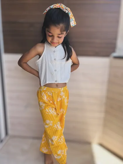 Another look at our sunny yellow floral set. The soft cotton and happy print make it a perfect choice for bringing a little brightness to any day.