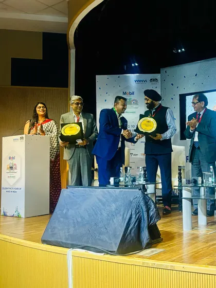 Facilitating an award presentation during the Make in India event. My role often includes guiding dignitaries through ceremonial proceedings with grace and precision.
