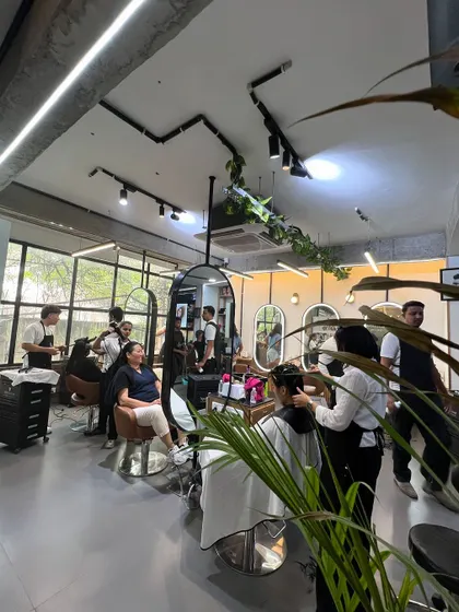 A busy day at the salon. I love the energy when my team is working together, helping clients achieve their desired looks in our modern and open space.