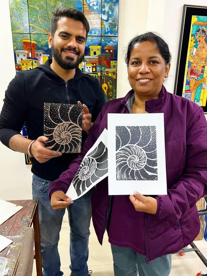 The fascinating spiral of a nautilus shell captured in a linocut print. A great example of how this technique can be used for detailed patterns.