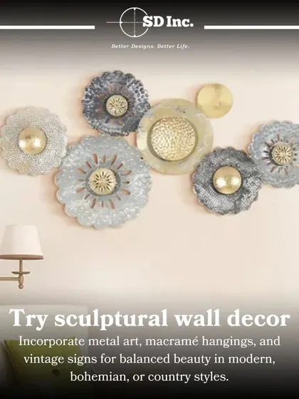 Sculptural wall decor can transform a flat wall into a focal point. We incorporate elements like metal art or macramé hangings to add beauty and balance to a room's design style.