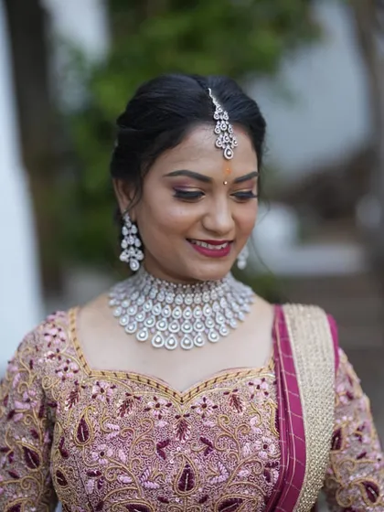 Our beautiful client Sindhuja chose a classic diamond-look CZ choker set for her event. The elegant design and sparkling stones give her a sophisticated and modern look.