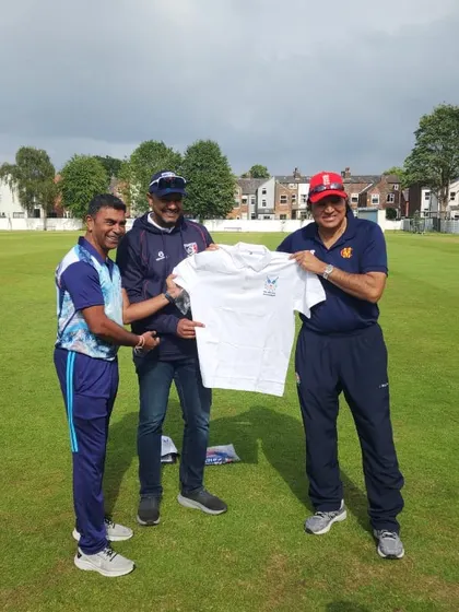 Exchanging team jerseys with the coaching staff at Urmstone. These moments of camaraderie and mutual respect are what make cricket a gentleman's game.