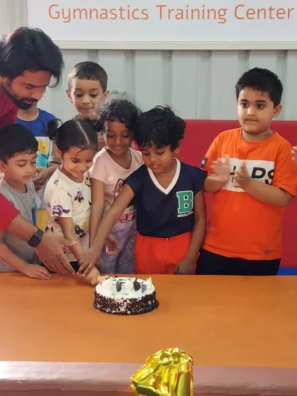 A close-up of the cake-cutting moment. These celebrations are what make our community so special.