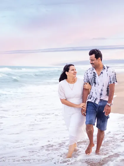A similar frame with a slightly different edit, showcasing the versatility of a single moment. The focus remains on the couple's relaxed interaction as they enjoy their walk, a perfect memory of their time together.