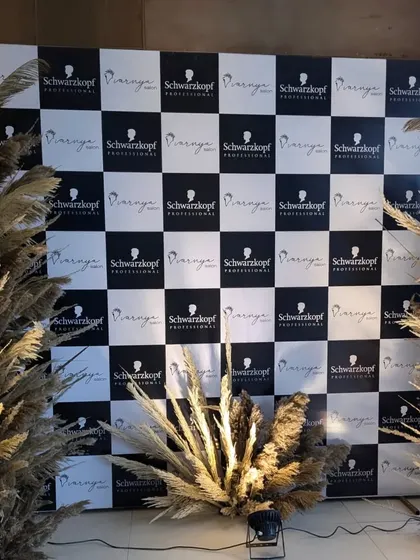 We create memorable photo opportunities that put your brand front and center. For this Schwarzkopf Professional launch event, we designed and installed a custom checkerboard backdrop, framed with stylish pampas grass for a modern, chic look.