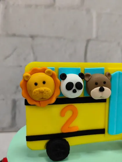Look at these cute little faces! I handcraft each fondant animal, like this lion, panda, and bear, to add a personal and charming touch to your child's cake.