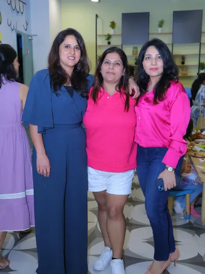 A group of stylish moms enjoying a day out at our facility. It's a social destination for parents too!