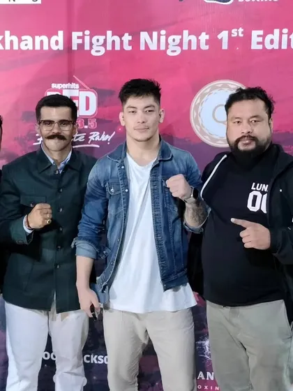 With fellow promoters and a fighter at the Uttarakhand event. Collaboration is key to building the sport.