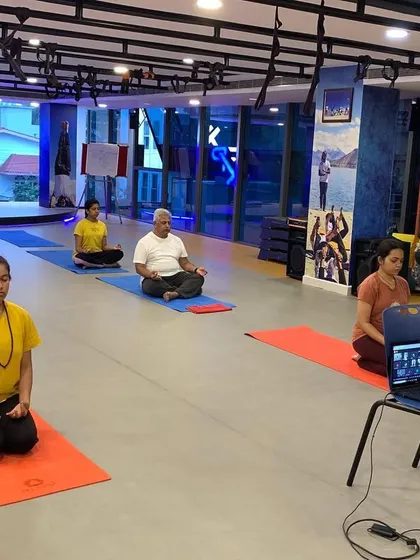 A hybrid class in session, with students practicing in the studio and joining online. I make sure everyone receives personal attention, whether in person or virtual.