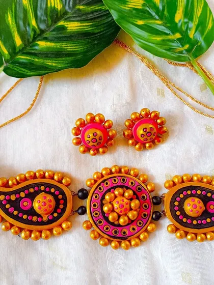 A pink and orange version of the paisley choker.