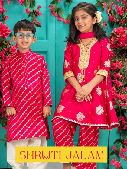 This Rakhi-ready sibling set in bright pink is designed to stand out. The boy's leheriya-style kurta complements the girl's richly embroidered sharara set, creating a vibrant and festive look.