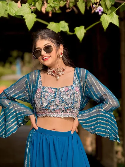 A fun and happy shot. The stylish choker adds a pop of color and personality to this beautiful blue outfit.