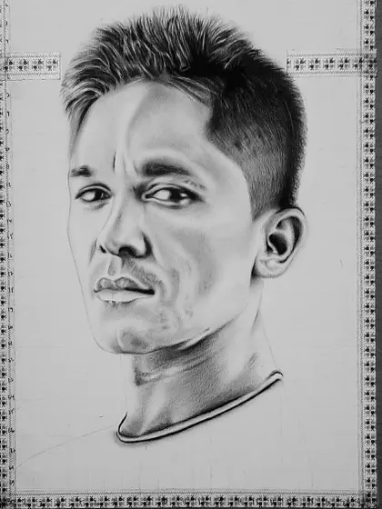 A detailed look at the 22 hours it took to draw Sunil Chhetri. You can see how I start with the eyes and build the portrait from there using the grid method.