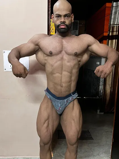 The front lat spread is a power pose that showcases your V-taper and chest thickness. Proper execution is key to looking as wide as possible on stage, and it's a fundamental part of my posing coaching.