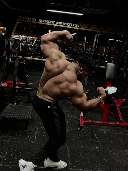 Another angle of the same powerful back pose.