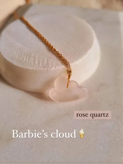A dreamy shot of my Rose Quartz cloud pendant, a piece I created to manifest loving vibrations and attract connection.