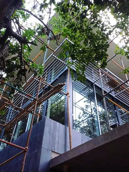 These under-construction photos show a home we are building that is nestled amongst and designed to frame the surrounding trees. Seeing the architectural form emerge from the landscape is a reminder that progress is something we must actively create, in harmony with nature.