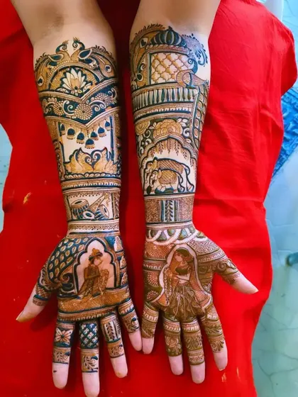 This design showcases a unique portrait style, with the bride and groom figures set against a backdrop of traditional doli and elephant motifs.