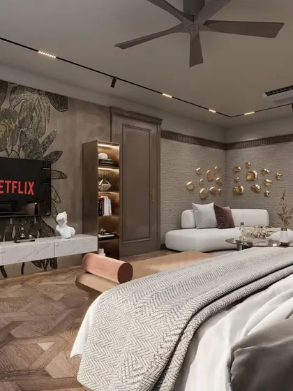 Another angle of the Punjabi Bagh master bedroom, showing the TV unit and wall decor. The design mixes modern furniture with classical architectural elements for a unique and personalized space.