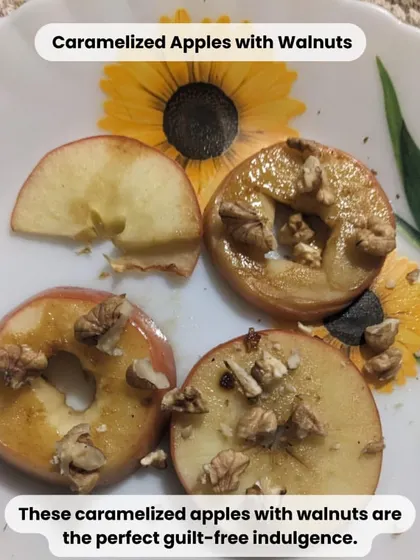 A perfect guilt-free indulgence: caramelized apples with walnuts. Sliced apples are lightly pan-cooked with a touch of jaggery and topped with crunchy walnuts for a simple, healthy dessert.