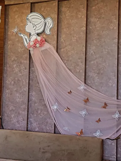 A clearer view of the custom wall decor I created for Miraya. The details, like the flowers on the dress and the butterflies on the tulle, make it a truly special piece.