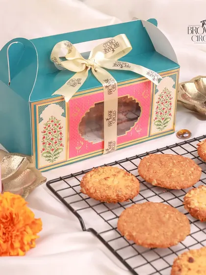 For a lighter, healthier gifting option, we offer hampers with our Honey Oat and Fruit & Nut cookies. They are packed in these beautiful, traditional-style boxes, perfect for festive giving.