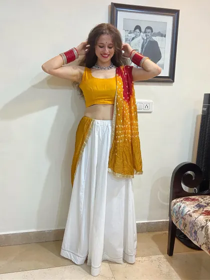 A photo from my Navratri celebration, dressed for Garba. I love the energy of this festival and enjoy creating vibrant dandiya and garba routines for groups.