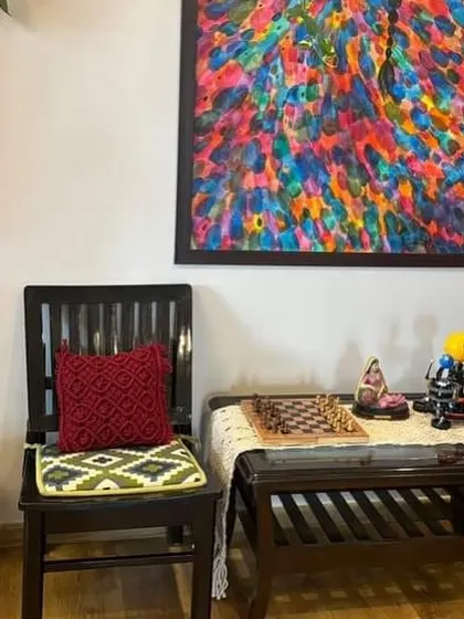 Even a single chair can be transformed with a handmade macrame cushion cover.