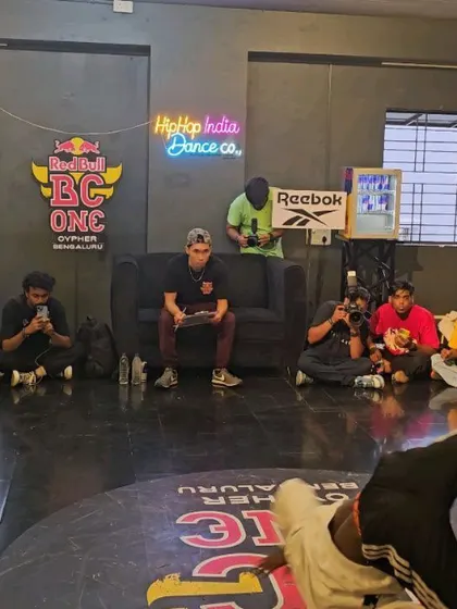 A b-boy mid-power move during the Red Bull BC One cypher at our studio. We regularly host high-profile events that connect our students to the global breaking scene.