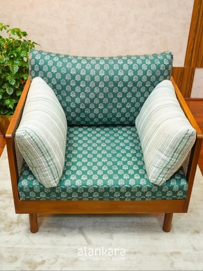 A top-down view of the single-seater sofa, showing the comfortable arrangement of the back and side cushions.