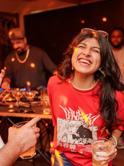 Pure joy on the dance floor. A guest laughing and having the time of her life while I spin the classics in the background.
