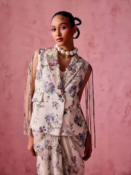 A close-up of the fusion blazer-saree look. The pearl necklace adds a touch of classic elegance to the modern silhouette, demonstrating my approach to balancing different style elements.