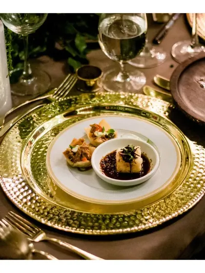 A beautifully plated small dish, part of a multi-course tasting menu for an intimate 30th birthday celebration, showcasing our fine-dining capabilities.