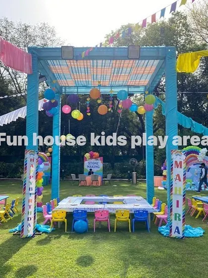 Another angle of the large outdoor festival-style party, showing how our rainbow furniture can be arranged to create different zones for dining and activities.