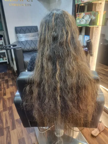 A dramatic before and after. This Kera-smooth treatment completely transformed her frizzy, damaged hair into long, straight, and healthy-looking locks with beautiful highlights.
