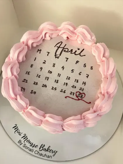 A custom calendar cake I made to celebrate a special anniversary in April. It's a sweet and personal way to mark an important date.