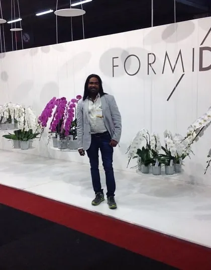 This minimalist and modern orchid display at an expo is very powerful. The clean lines and simple color palette show that sometimes less is more.